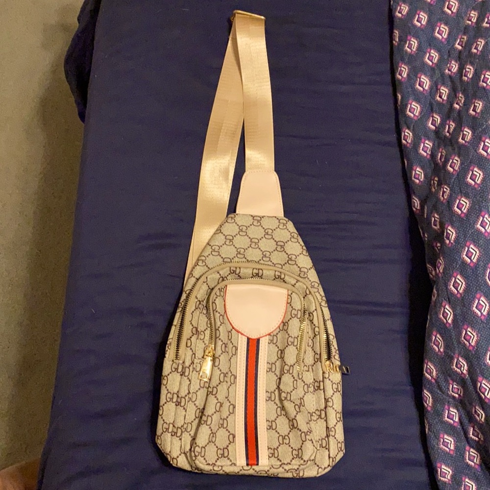 NEOT Sling back crossbody bag.  Khaki and brown.